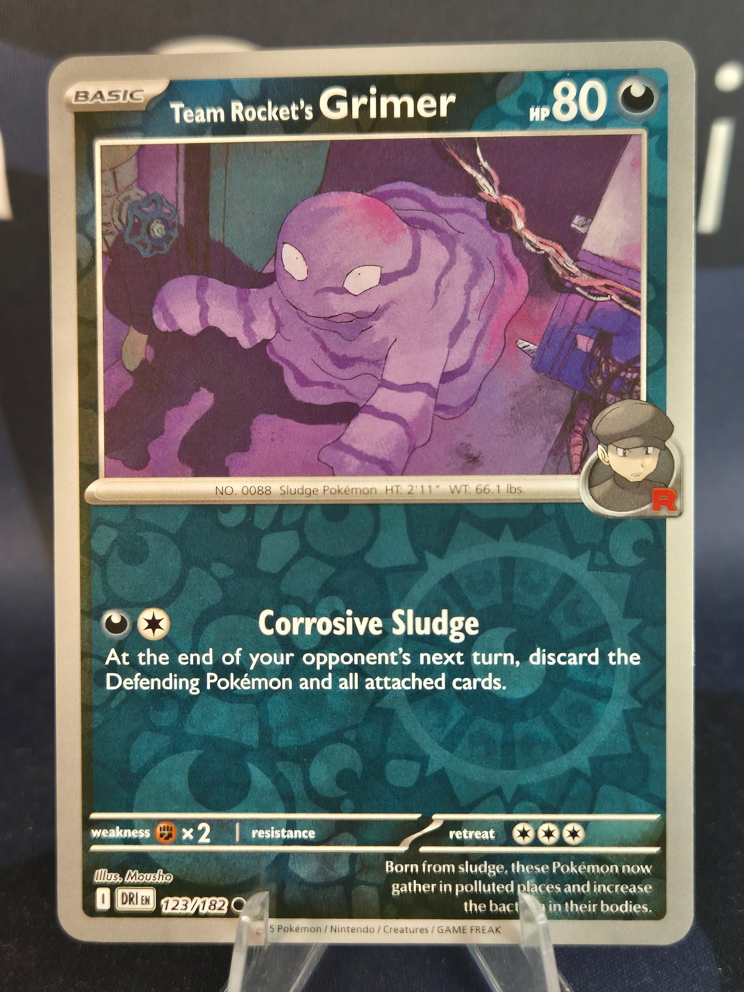 Team Rocket's Grimer 123/182 Destined Rivals Reverse Holo