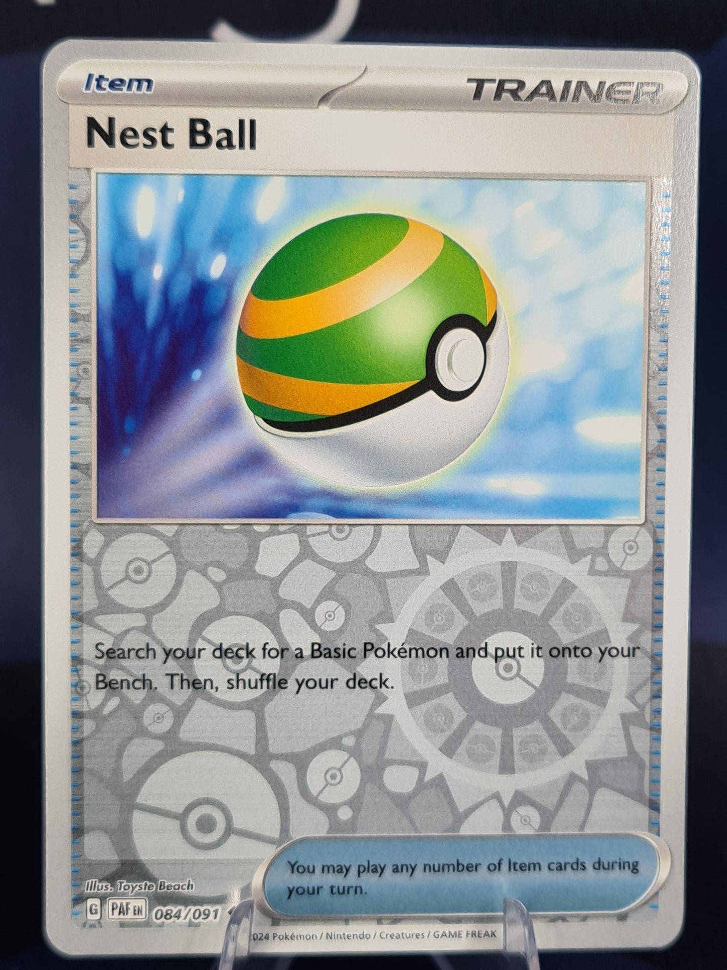 Nest Ball 084/091 Paldean Fates RH