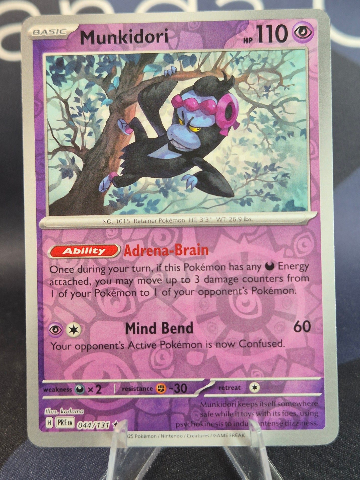 Munkidori 044/131 Prismatic Evolutions Reverse Holo