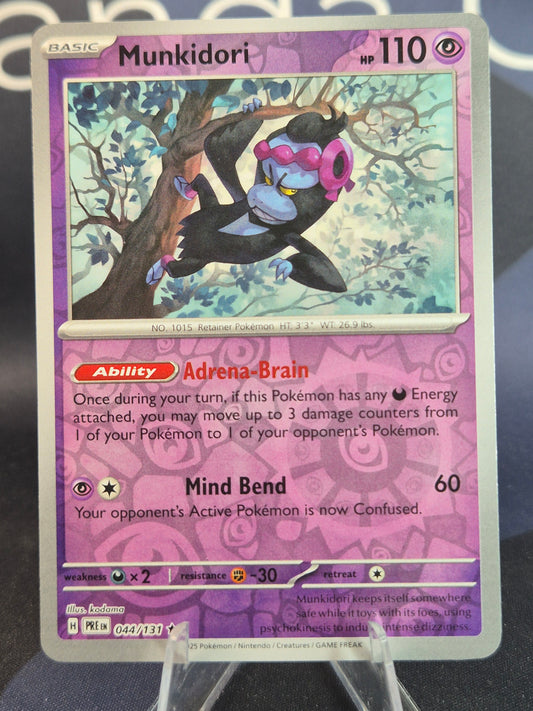 Munkidori 044/131 Prismatic Evolutions Reverse Holo