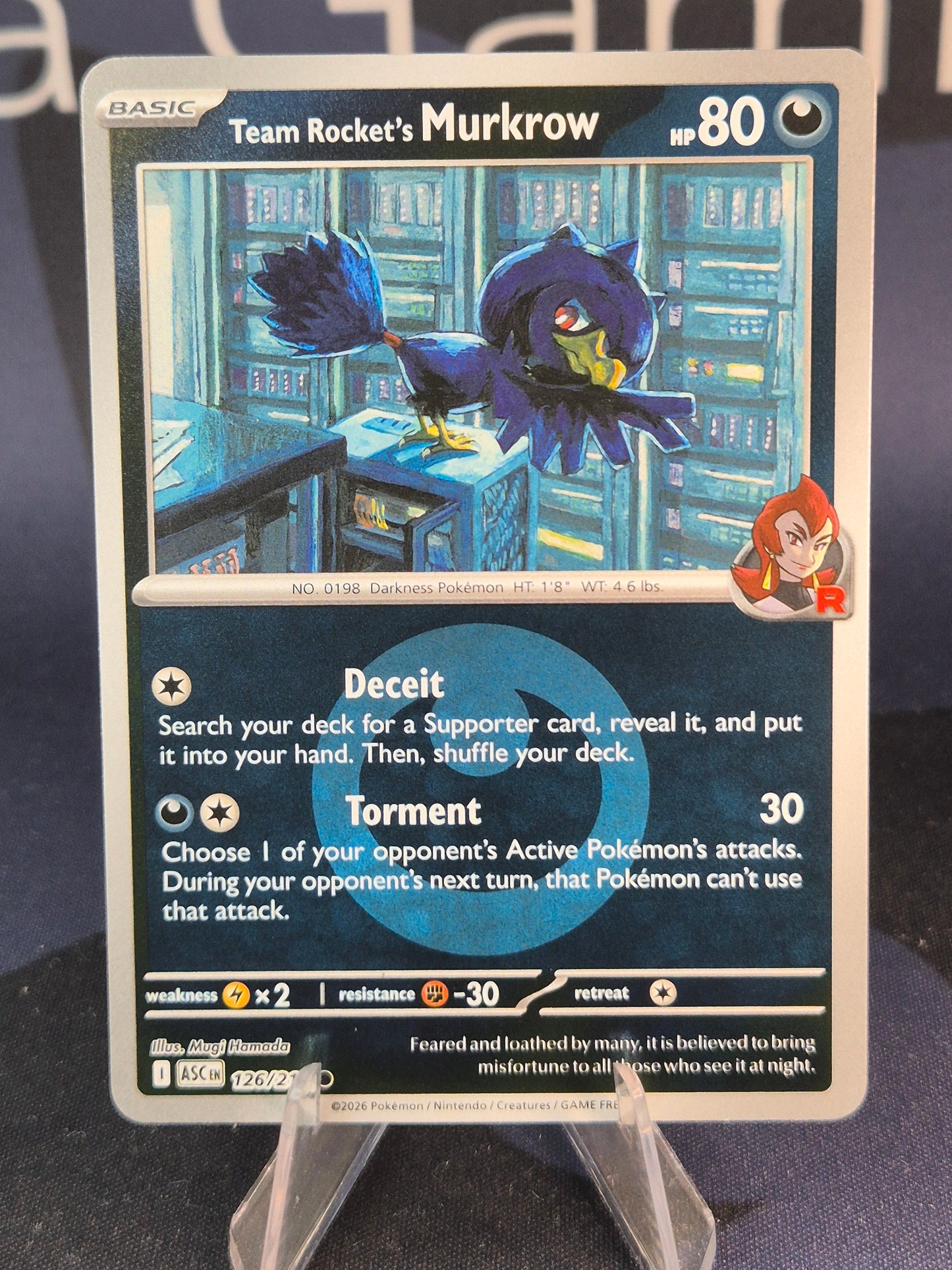Team Rocket's Murkrow 126/217 Ascended Heroes Reverse Holo